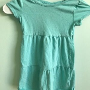 A girls blue flowy dress